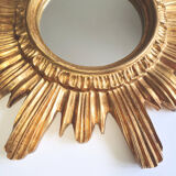Sun mirror in gilded wood