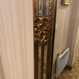 Mirror with a glazing bar