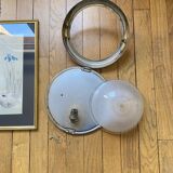 Thick glass ceiling light fixture with a chrome metal support, Holophane type.