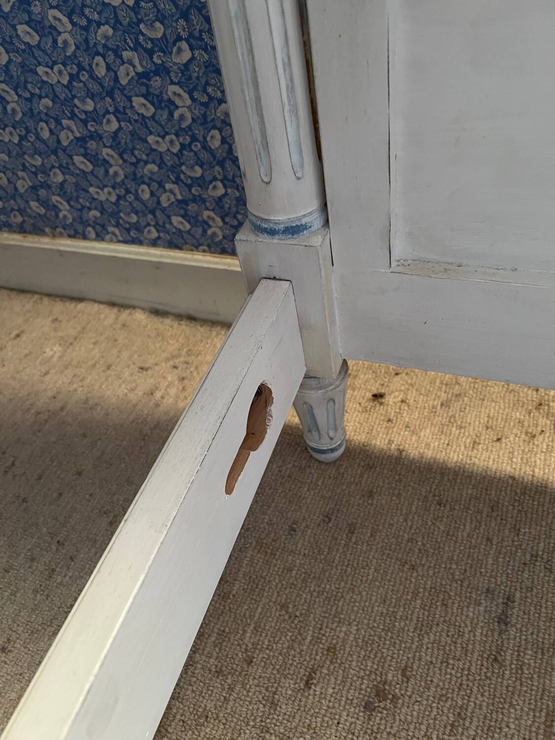 White wooden cane bed