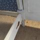 White wooden cane bed