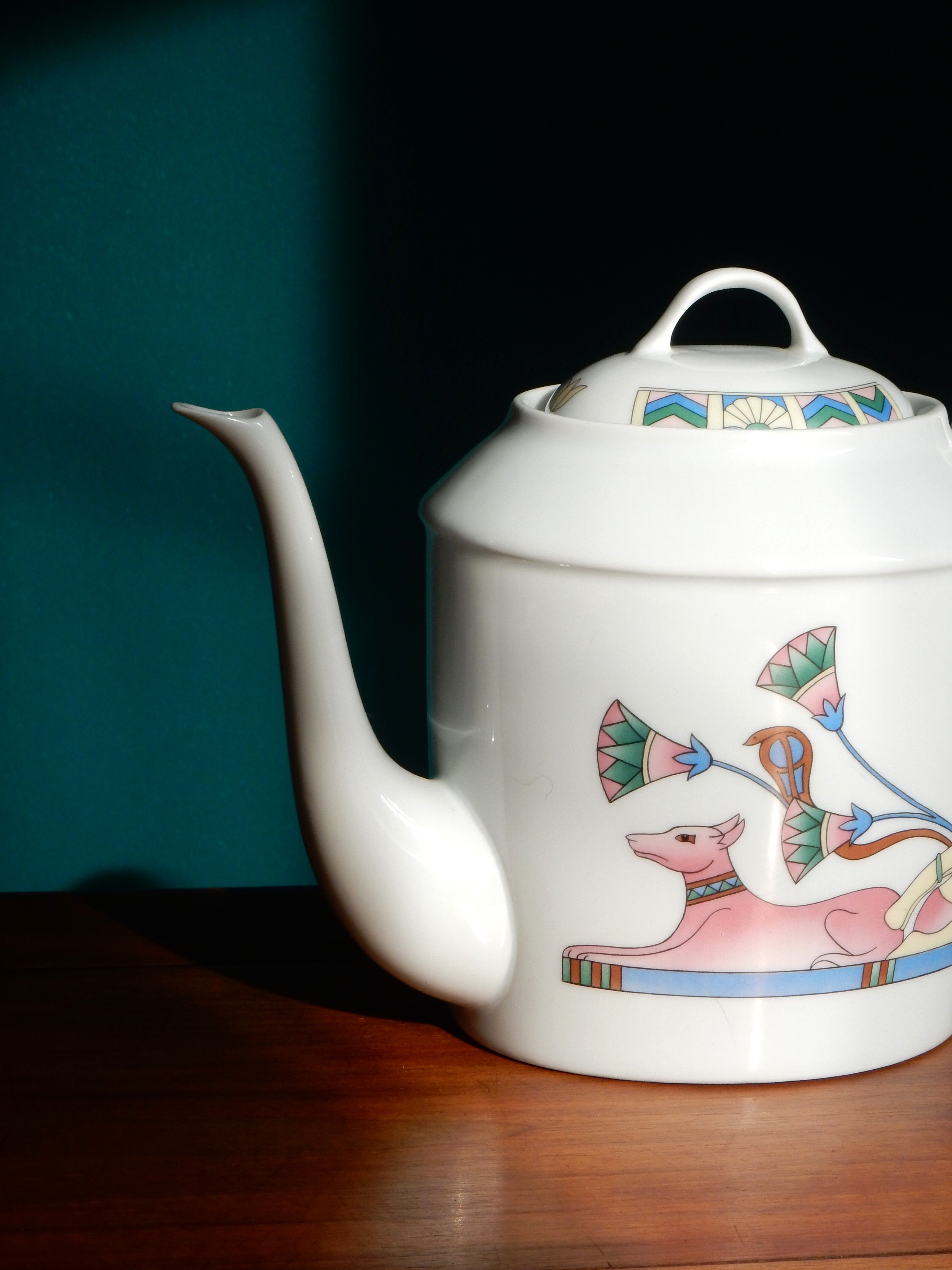 Limoges coffee maker inspired by ancient Egypt in the style of the 80s