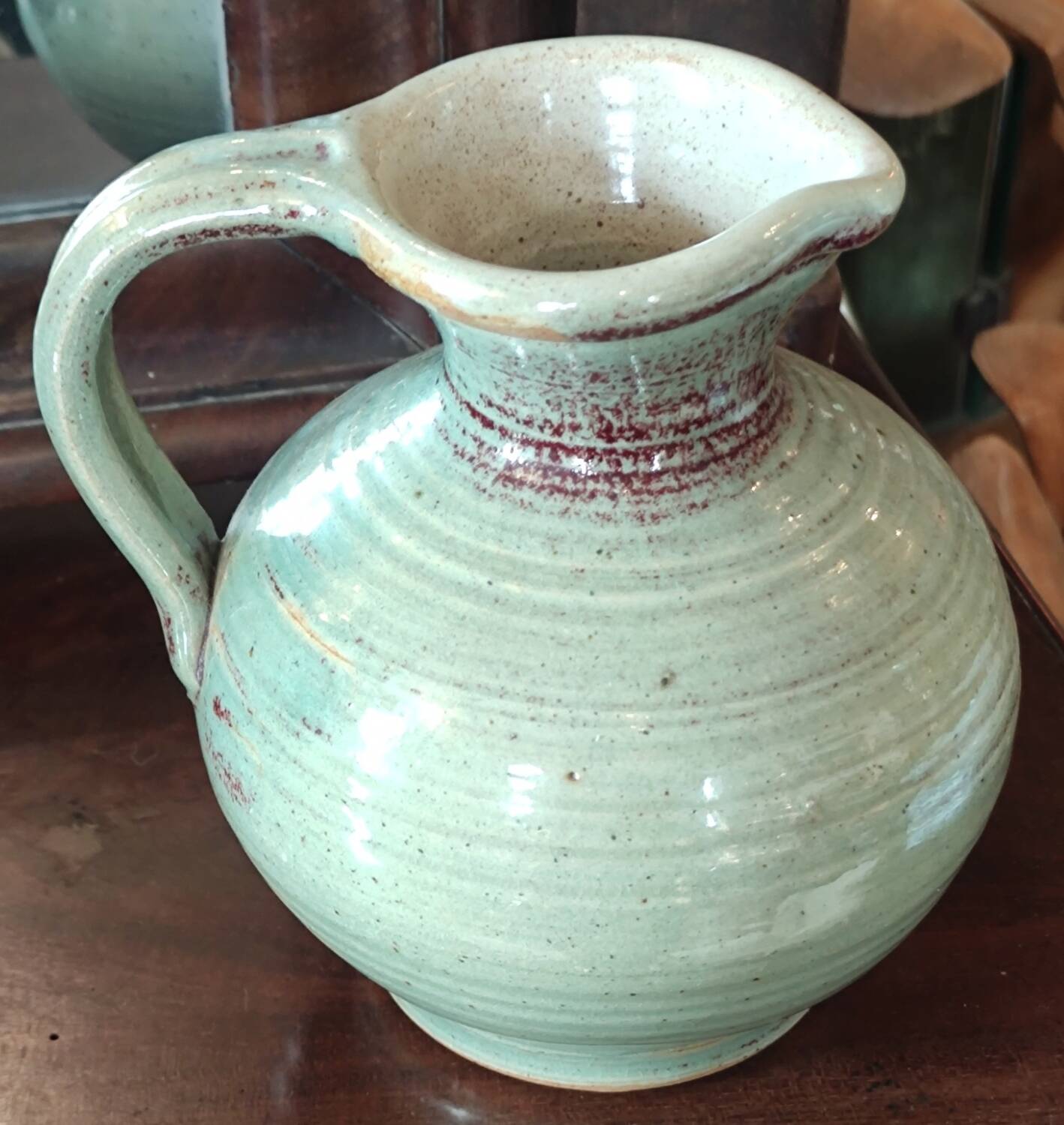 Old small glazed ceramic pottery pitcher