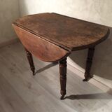 Round table old solid oak wheels 2 extensions folding sides