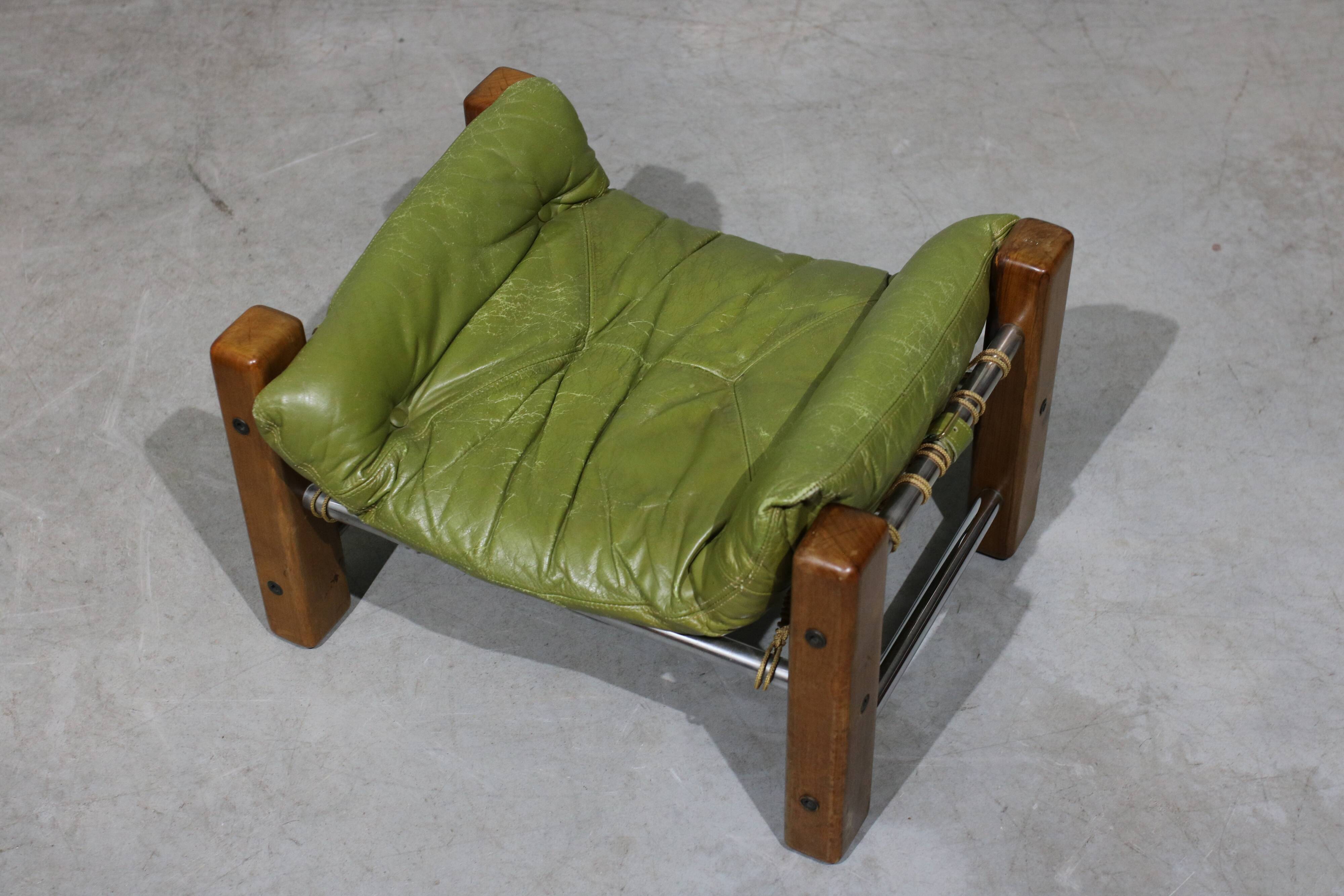 Leather Armchair and Ottoman by Jean Gillon