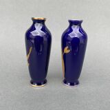 Pair of 1900 Limoges vases with blue background and gold highlights, R. Rosier decorations