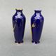 Pair of 1900 Limoges vases with blue background and gold highlights, R. Rosier decorations