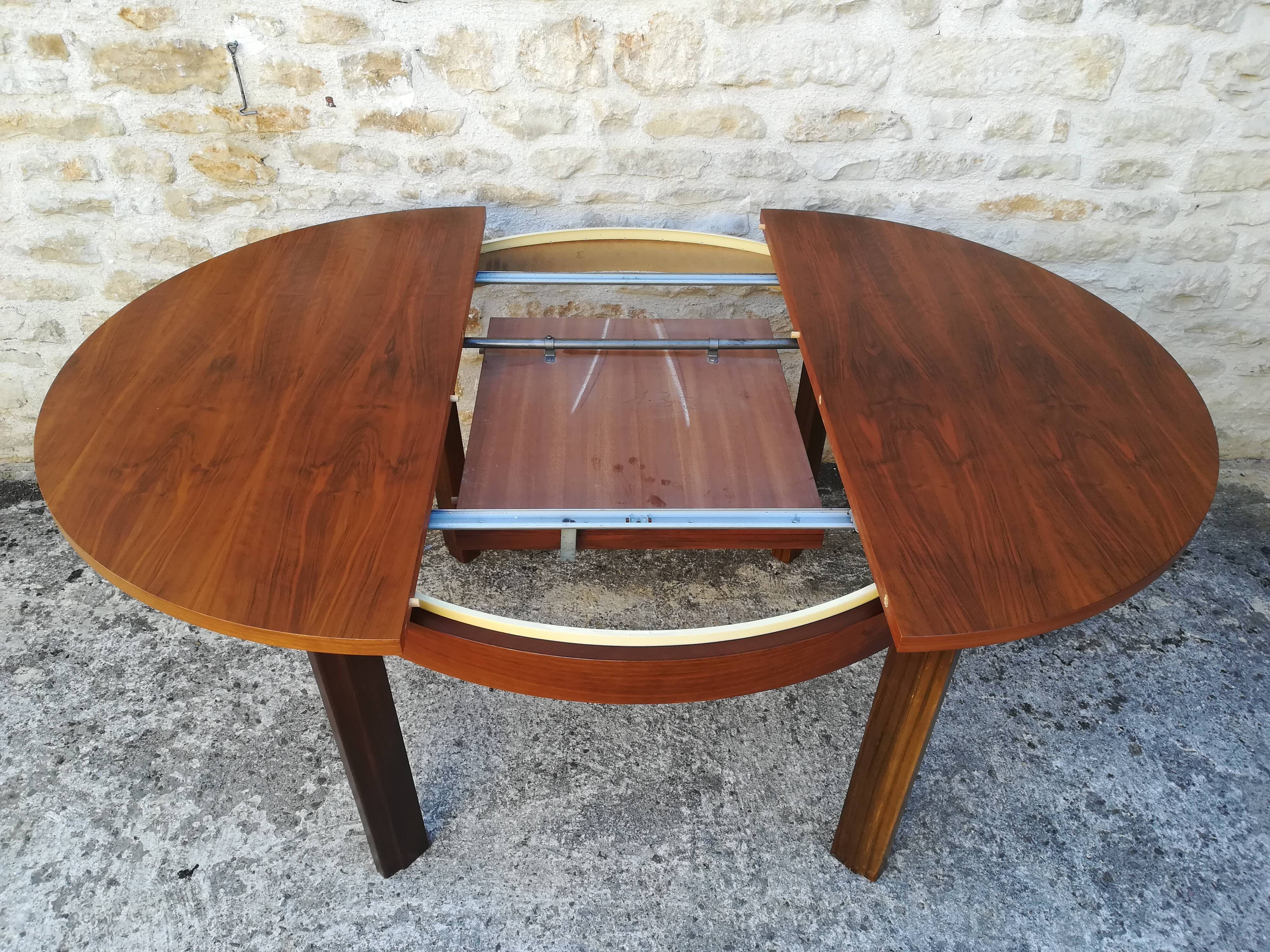 Round table with an extension