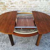 Round table with an extension