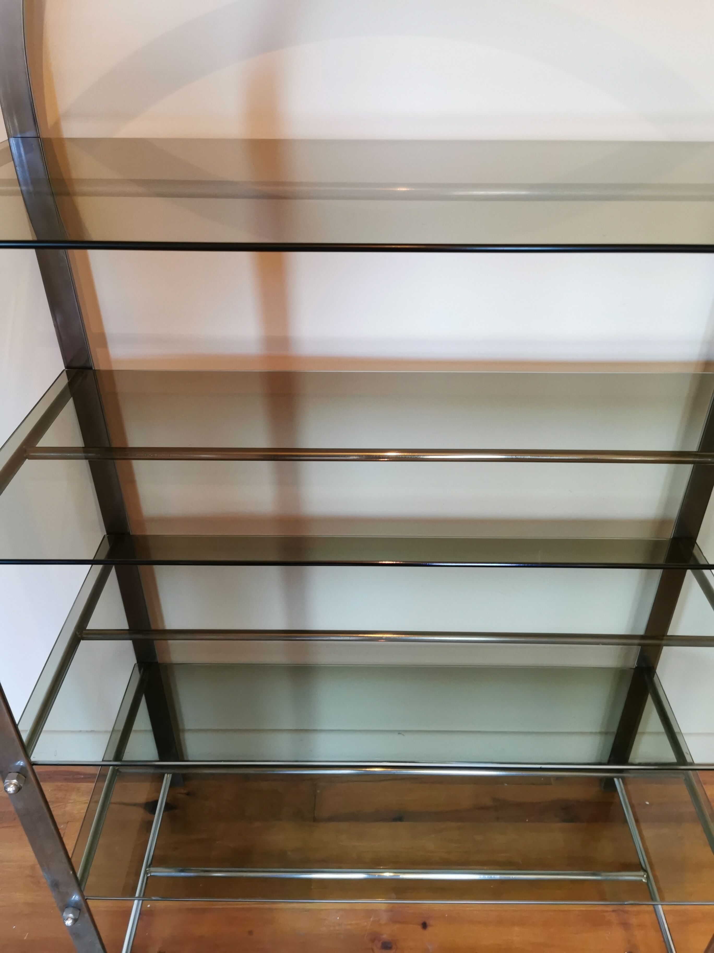 Rounded shelf from the 70s in chrome metal and glass