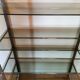 Rounded shelf from the 70s in chrome metal and glass