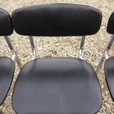 6 vintage chairs in black skaï with chrome metal tubular base.
