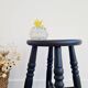 Antique black wooden stool, renovated
