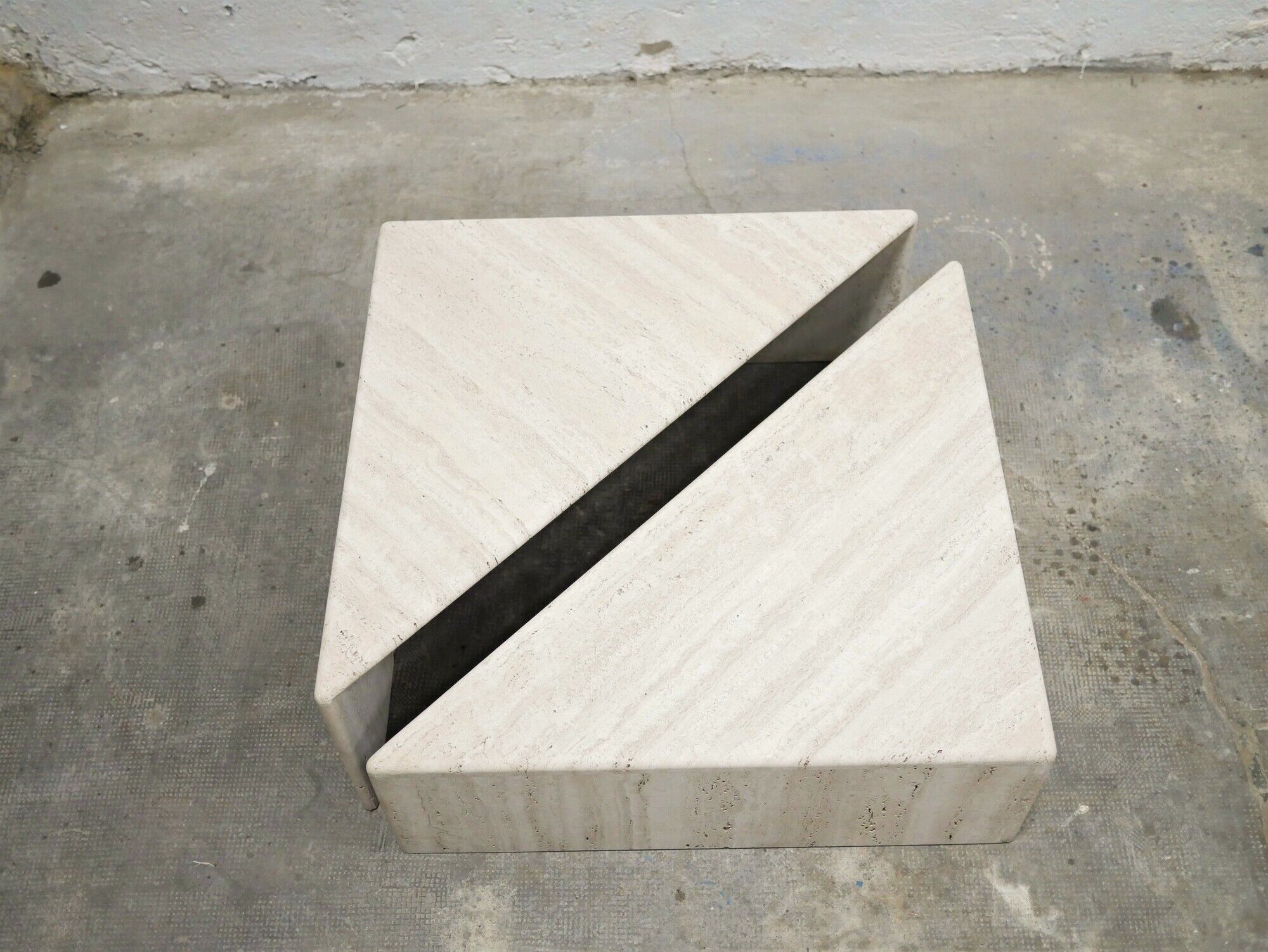 Series of 2 vintage travertine coffee tables published by Roche Bobois