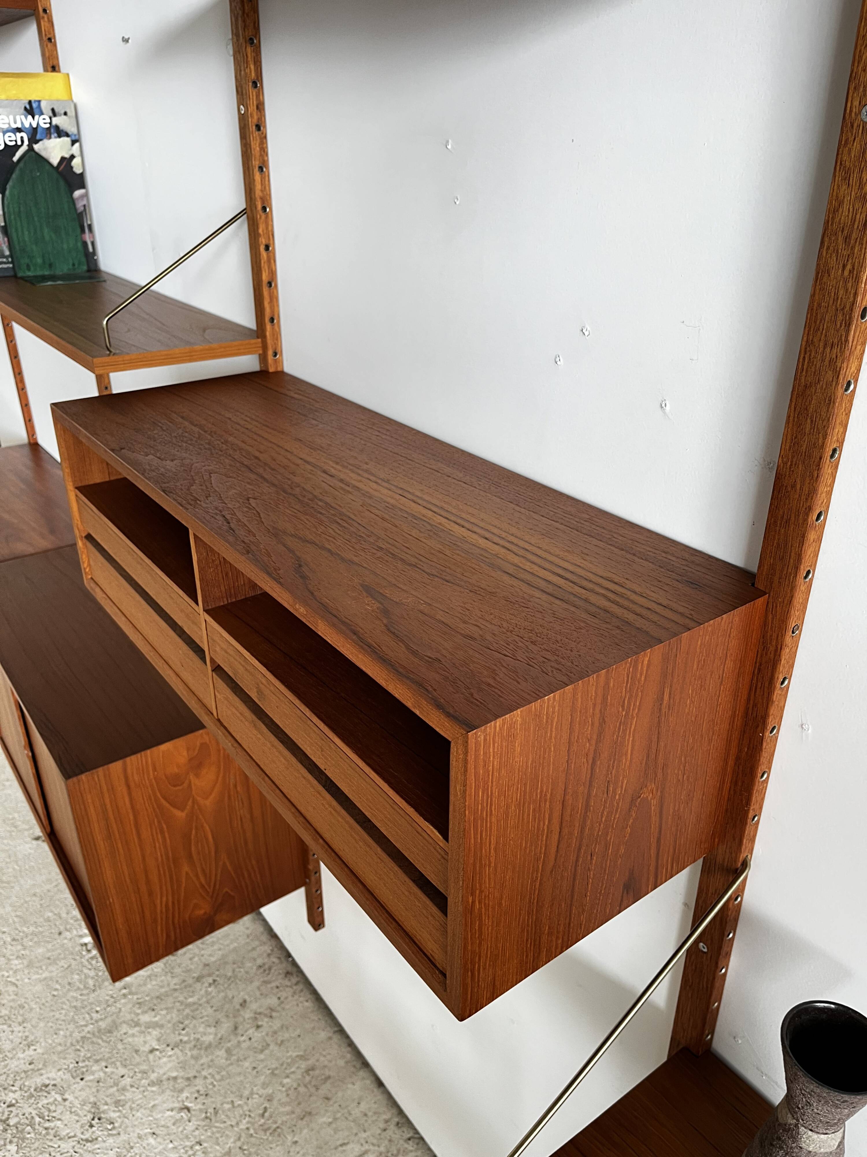 A wall unit with 4 compartments by Poul Cadovius, Denmark, 1960s.