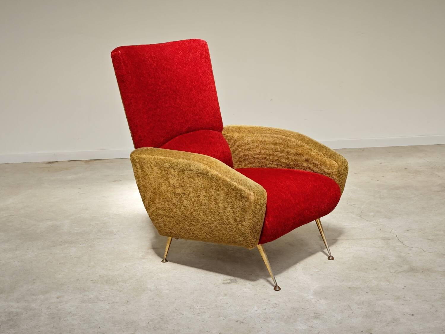 Red and mustard yellow fabric armchair in 1970s style