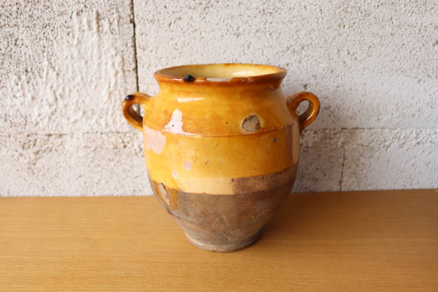 Small old yellow glazed terracotta pot