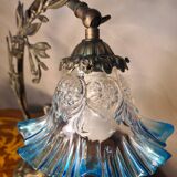Bronze and brass lamp, transparent and blue glass shade.