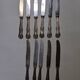 Lot de 11 couteaux pied en argent lame en métal inoxydable coquillage