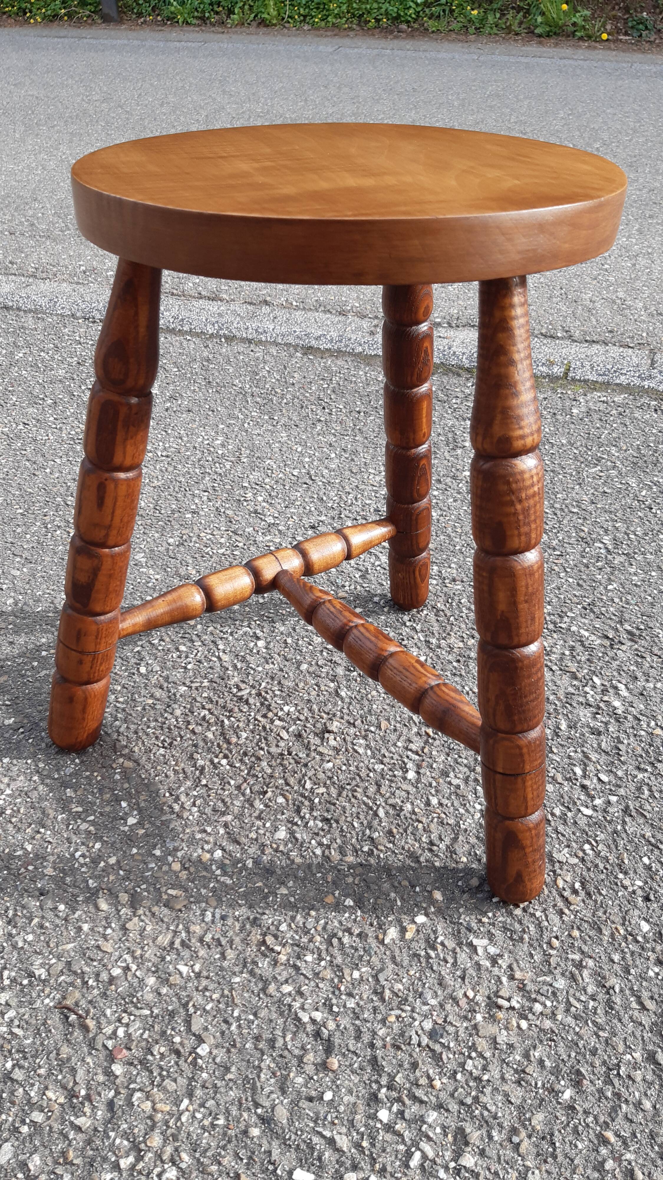 Wooden tripod stool with turned legs