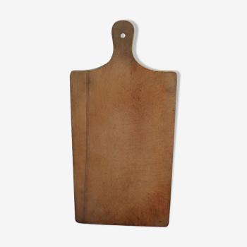 Wooden cutting board with handle