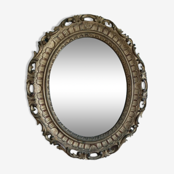 Mirror oval frame carved gilded patinated