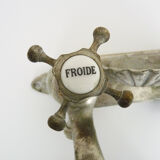 Old bathtub faucet, kitchen in silvered bronze with its shell-shaped soap dish