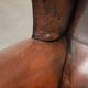 Vintage sheepskin wingback armchair in a deep brown colour finished