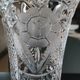 Vintage vase in stylish bohemian chic crystal, floral motifs, braces