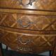 Small curved chest of drawers in Louis XV style with marquetry.