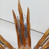 2 wooden sun mirrors and golden plaster
