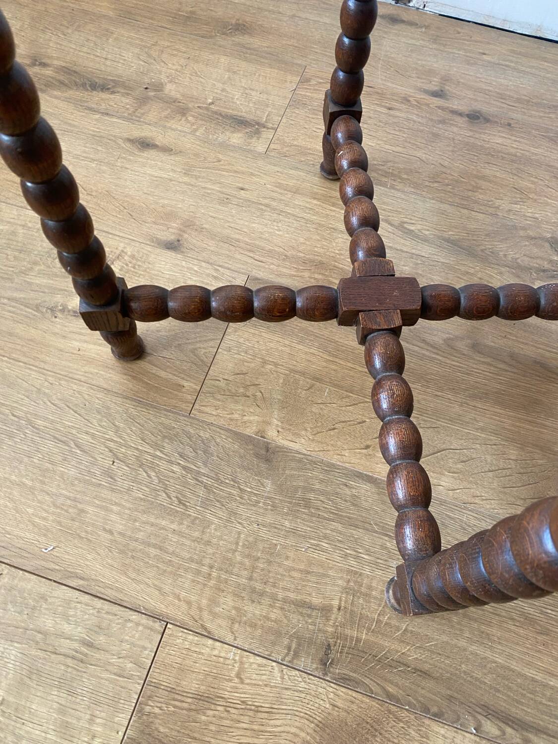 Side table with turned, beaded wooden legs