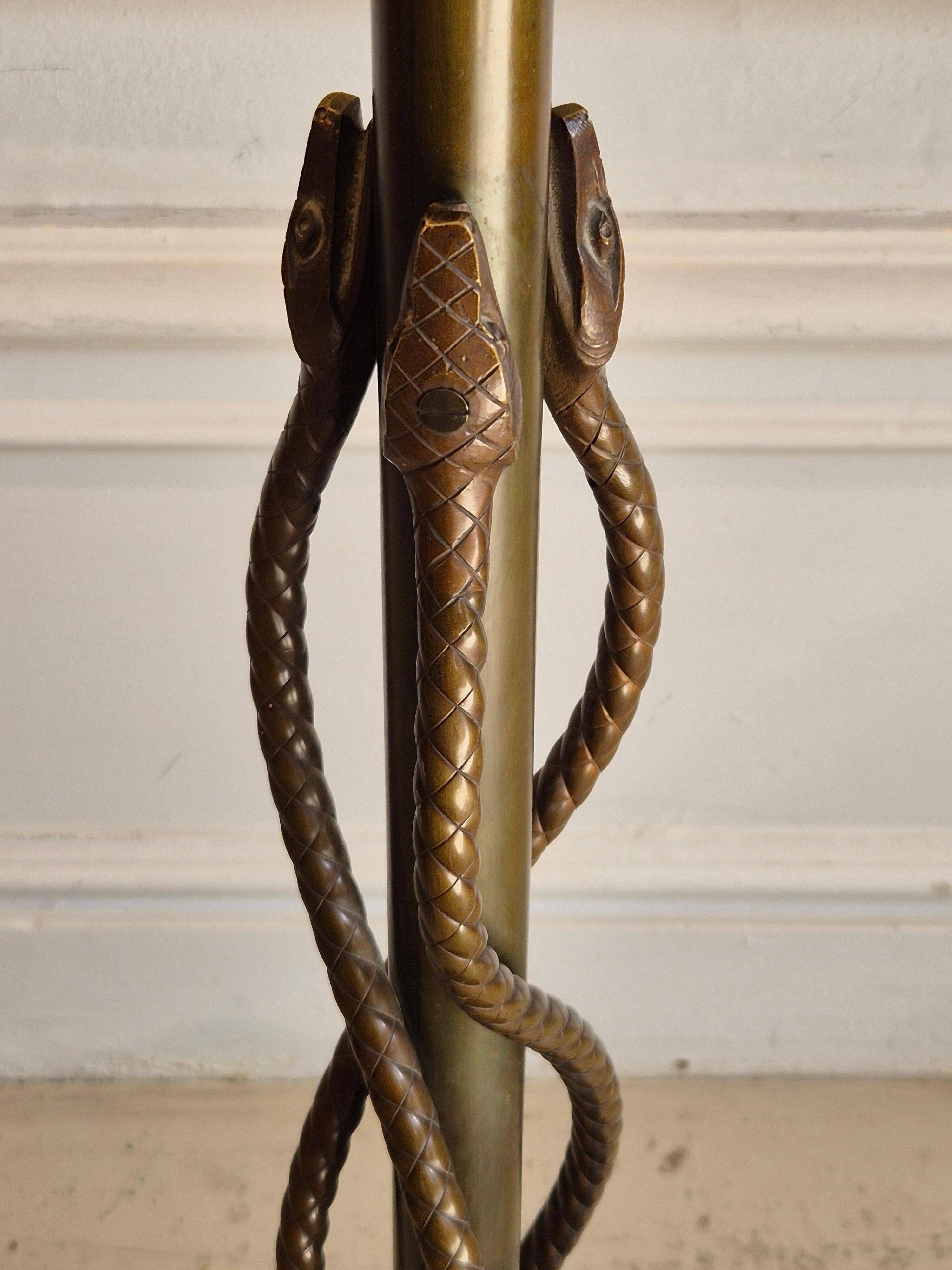 Rare and exquisite bronze floor lamp with intertwined snakes, early 1900s.
