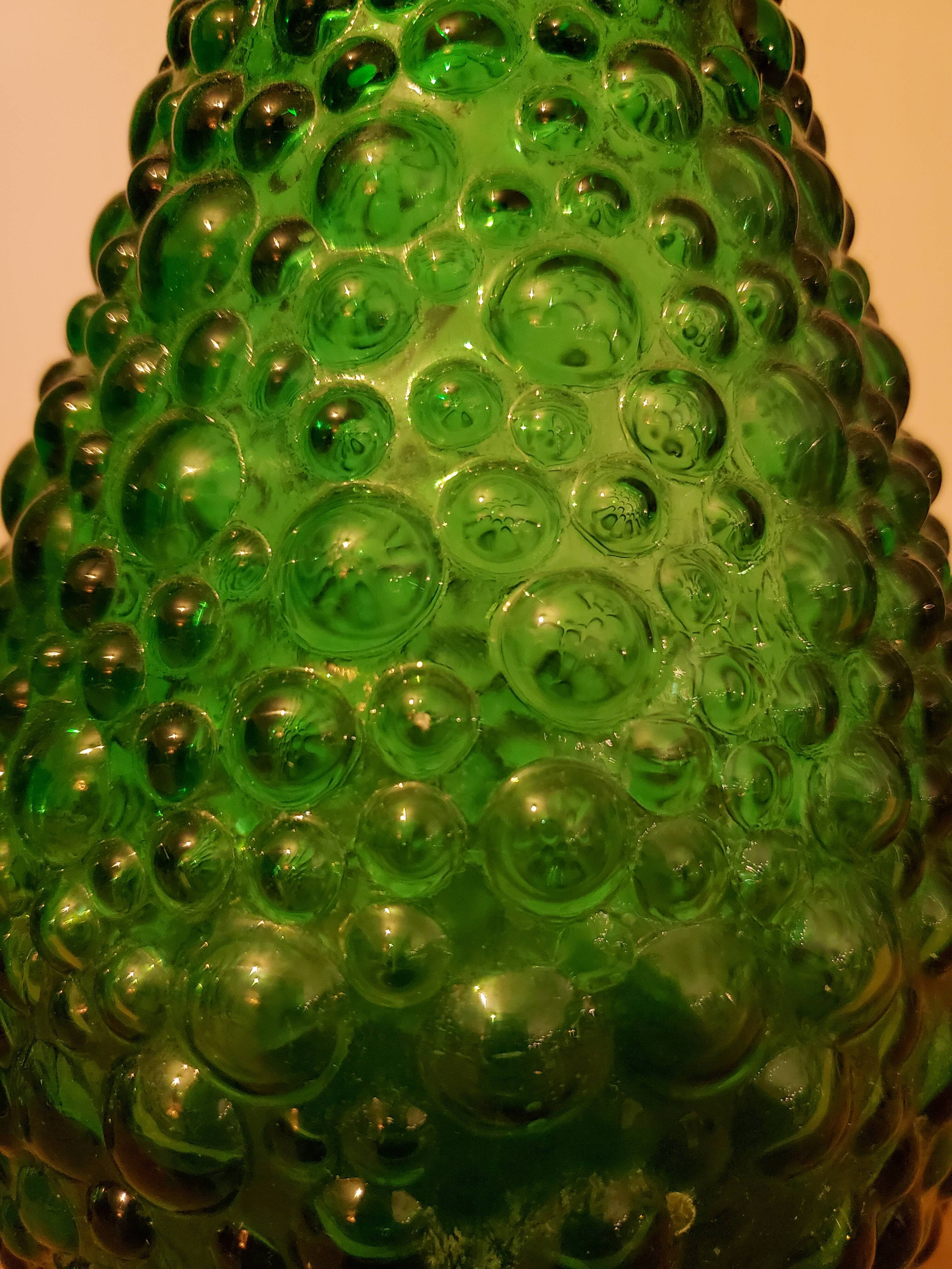 Set of green bubble glass bottles