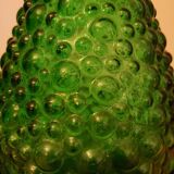 Set of green bubble glass bottles