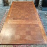 Old table in chene with extension cords