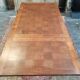 Old table in chene with extension cords