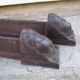 Pair of ancient cast iron channels, antique heads