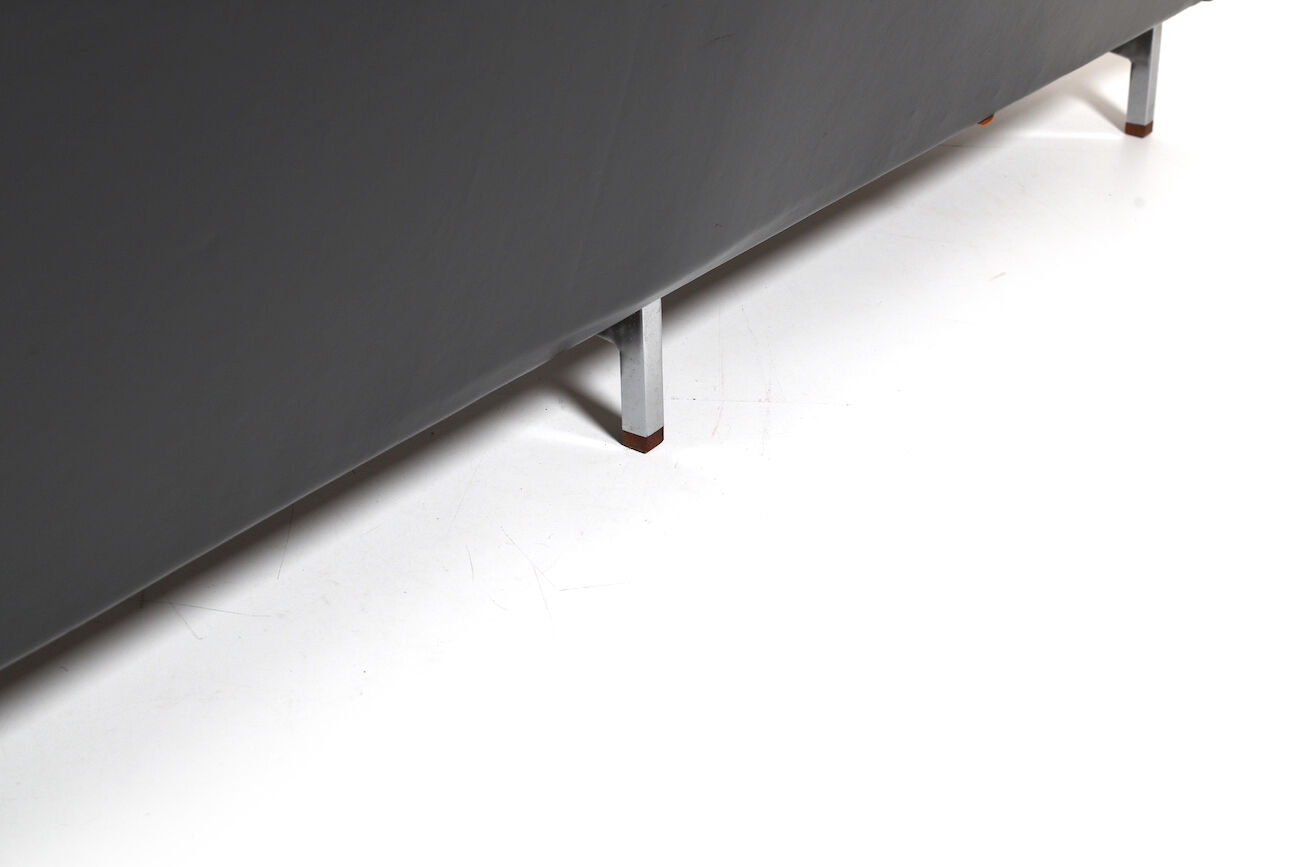 Danish leather sofa with chrome legs and teak ends