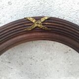 Oval-shaped wooden frame