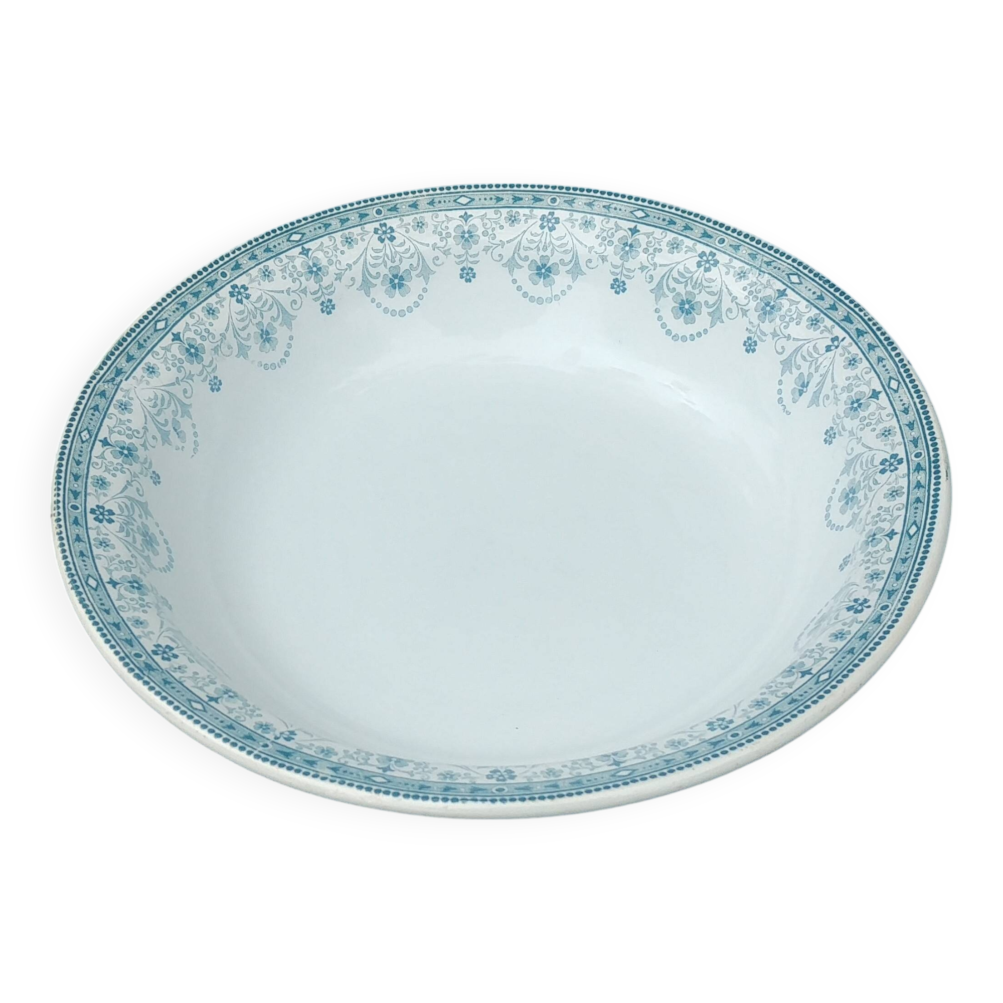 Grand plat rond de service en terre de fer de la faïencerie Moulin des Loup