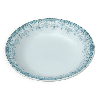 Grand plat rond de service en terre de fer de la faïencerie Moulin des Loup