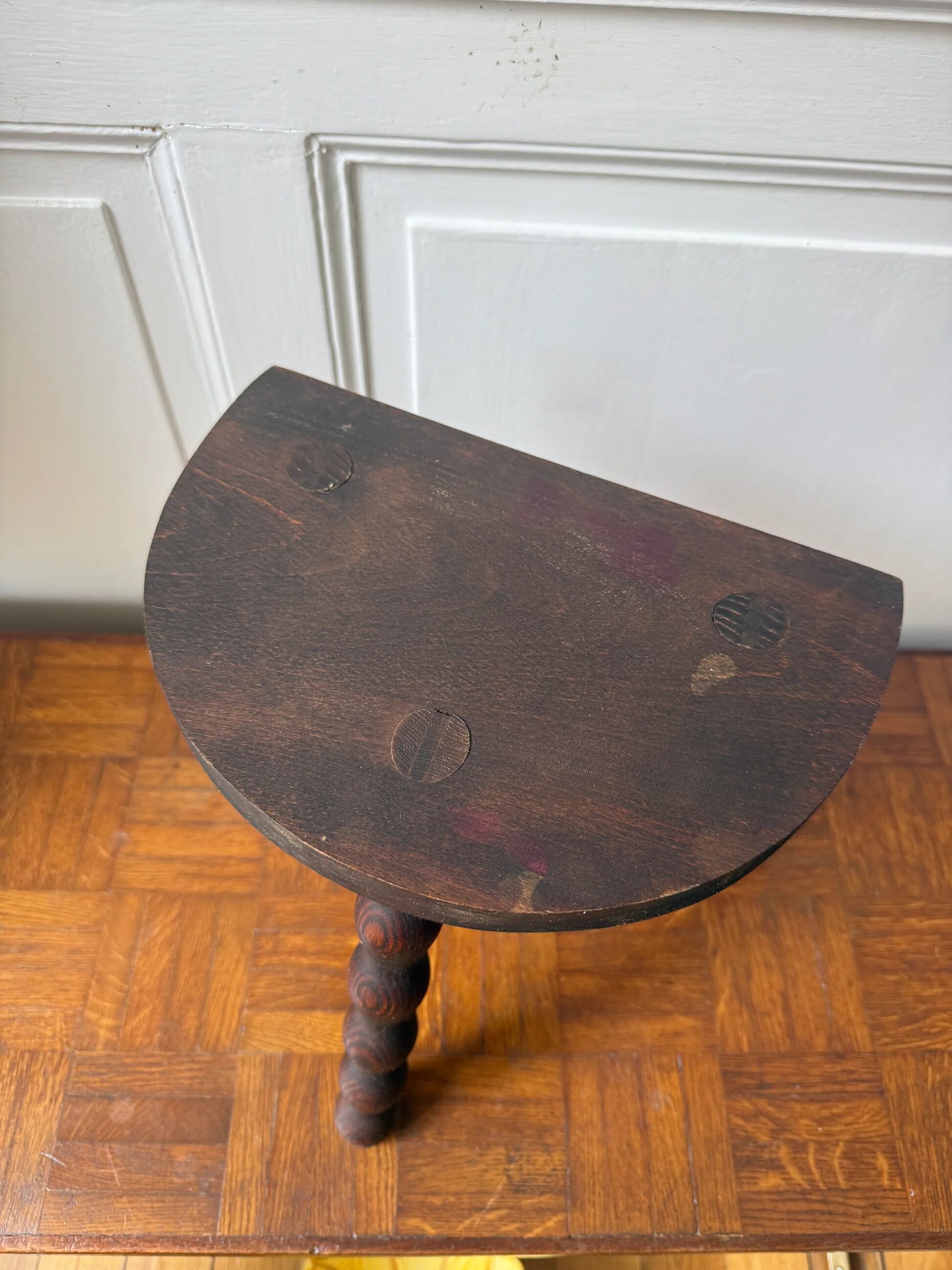 Three-legged turned wooden stool
