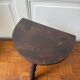 Three-legged turned wooden stool