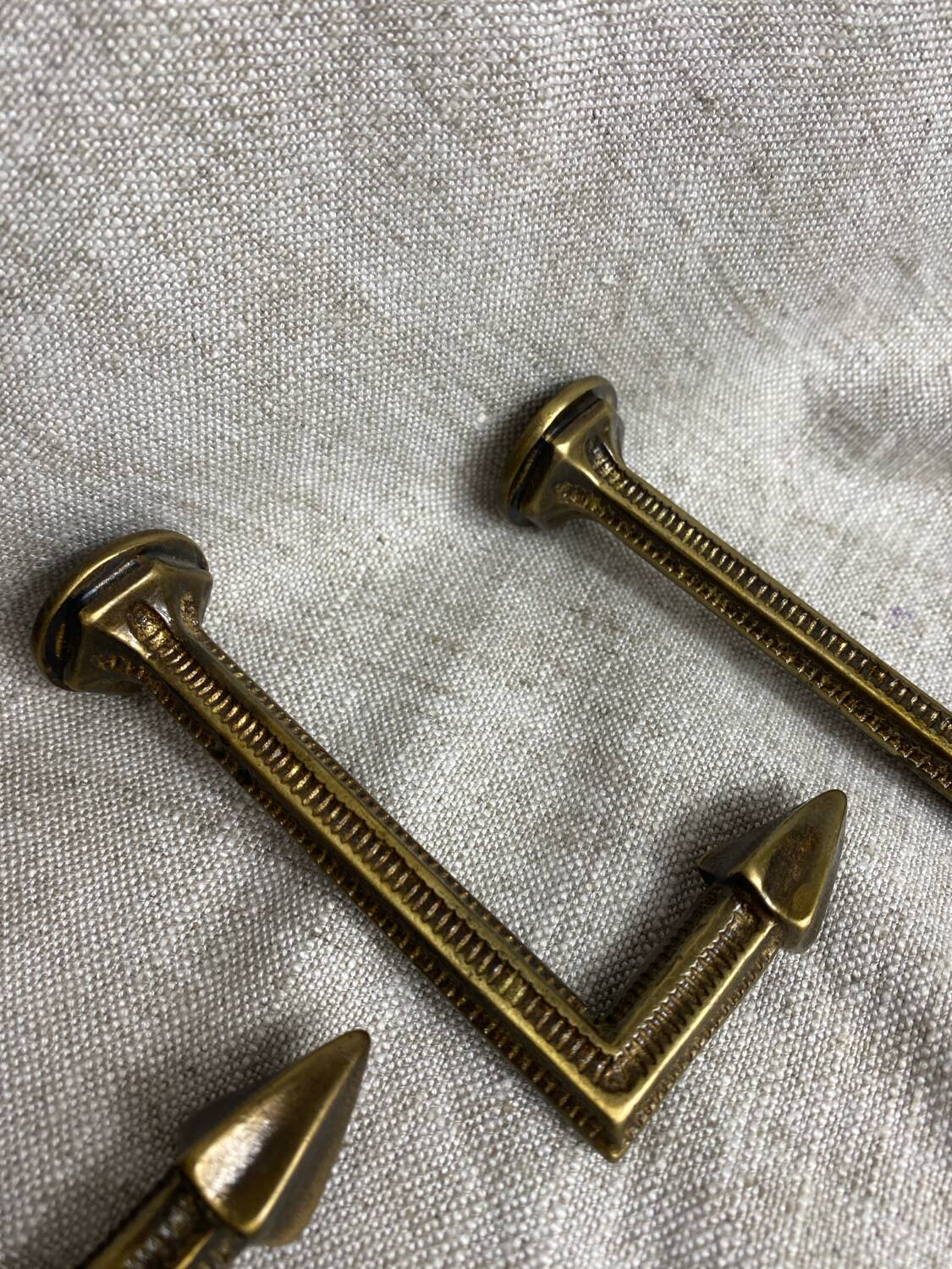 Antique brass curtain hooks and tiebacks