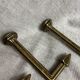 Antique brass curtain hooks and tiebacks