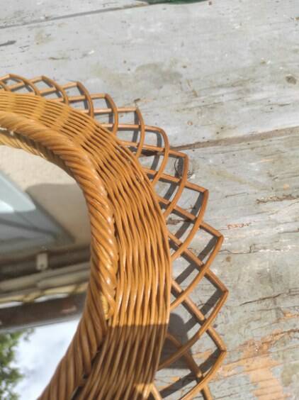 Vintage wicker flower mirror