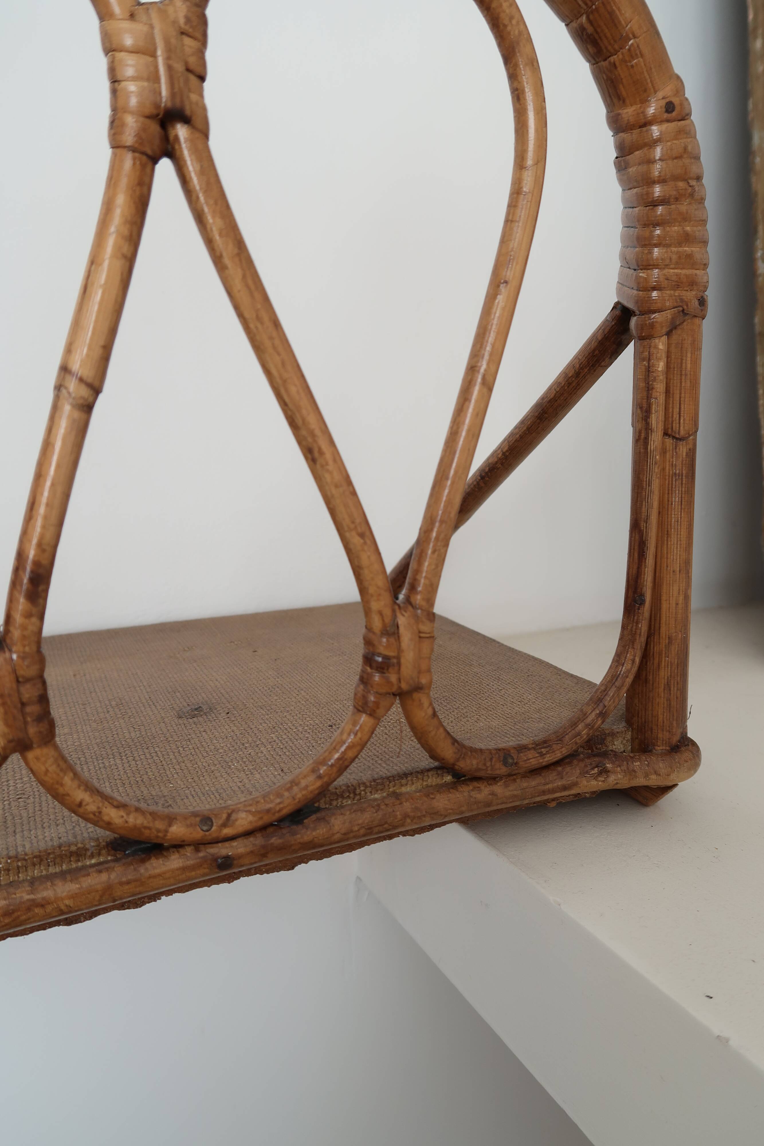 Pair of rattan wall shelves