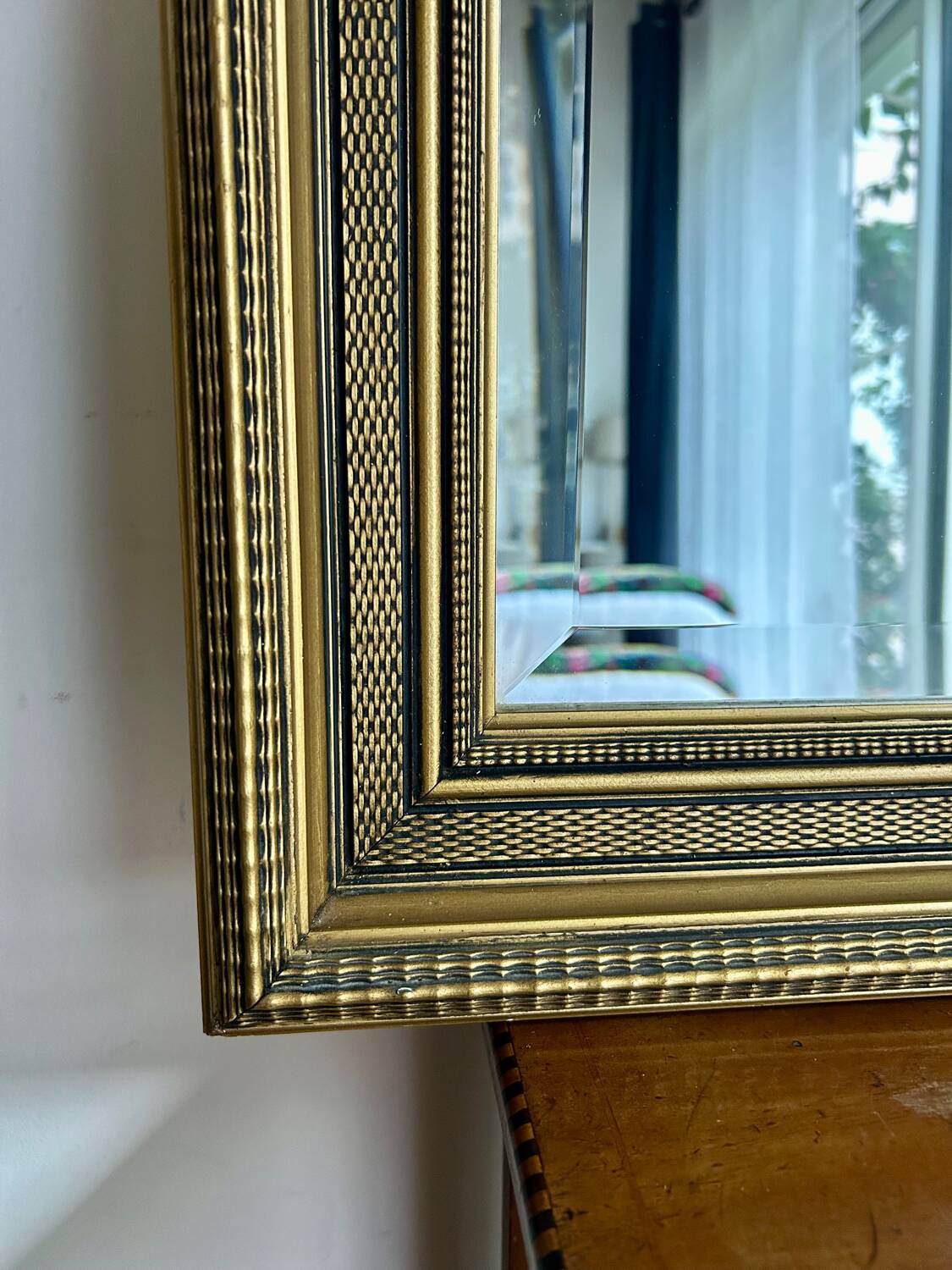 Large antique beveled mirror in the Napoleon III style - Gold and black frame