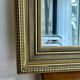 Large antique beveled mirror in the Napoleon III style - Gold and black frame